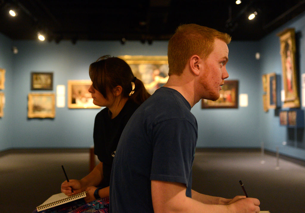 From left, Bailee Jess and Blake Knight sketch Tuesday at the Museum of Art and Archaeology.